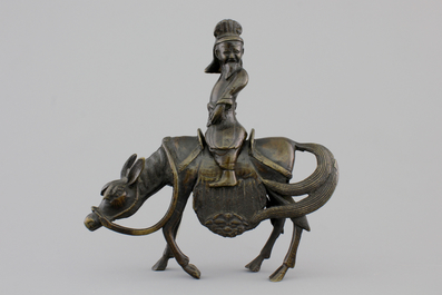 A Chinese bronze figure of a sage on a donkey, 18/19th C