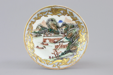 A Chinese famille rose and gilt cup and saucer with a harbour scene, Yongzheng, 1722-1735