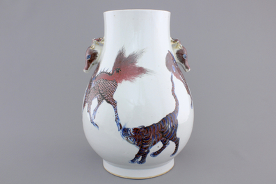 A Chinese hu-shaped deer-handled underglaze red and blue vase with finely painted animals, ca 1900