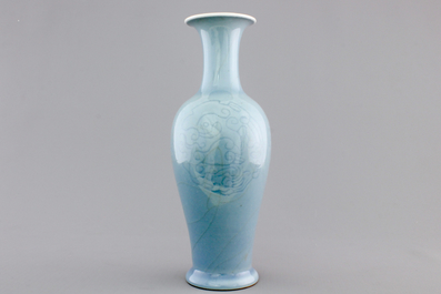 A Chinese porcelain monochrome underglaze decorated vase, 19/20th C.