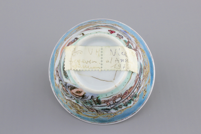 A Chinese famille rose and gilt cup and saucer with a harbour scene, Yongzheng, 1722-1735