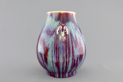 A Chinese porcelain flambe hu-shaped vase with elephant handles, 19/20th C.