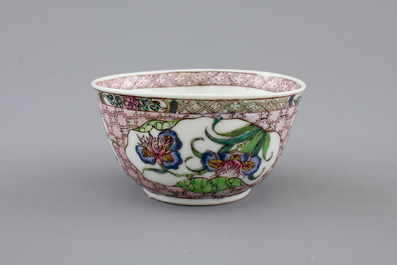 A Chinese famille rose porcelain cup and saucer with narcissus, chrysanthemum and peony, Yongzheng, 1722-1735