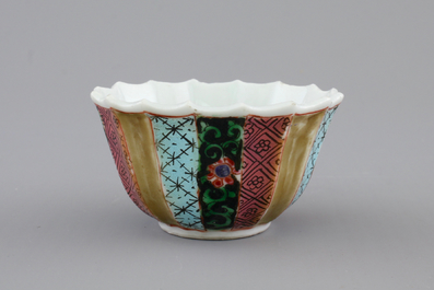 A Chinese famille rose porcelain cup and saucer with fishermen, Yongzheng, 1722-1735
