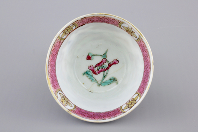 A Chinese famille rose and gilt cup and saucer with a harbour scene, Yongzheng, 1722-1735