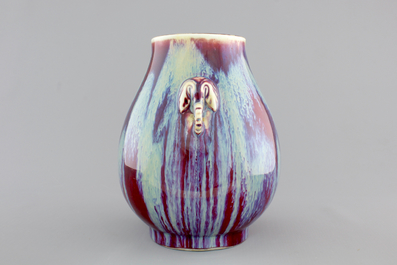 A Chinese porcelain flambe hu-shaped vase with elephant handles, 19/20th C.