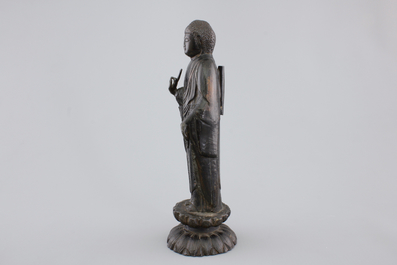 A bronze figure of a Guanyin on lotus flower, Ming Dynasty, 16/17th C