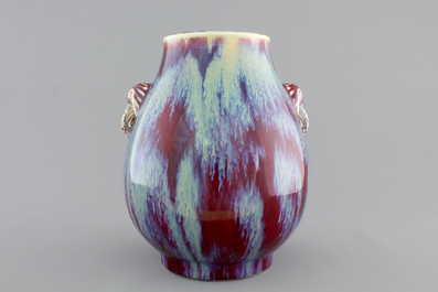A Chinese porcelain flambe hu-shaped vase with elephant handles, 19/20th C.