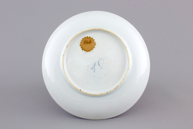 A Dutch-decorated Chinese porcelain saucer plate with parrots, 18th C.