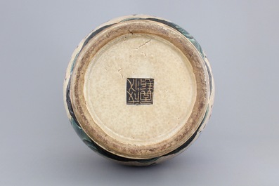 A Chinese famille rose and crackled glaze vase, Nanking, 19th C.