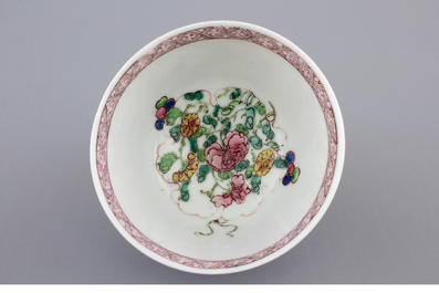 A Chinese famille rose porcelain cup and saucer with narcissus, chrysanthemum and peony, Yongzheng, 1722-1735