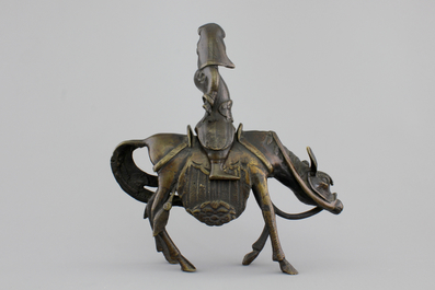 A Chinese bronze figure of a sage on a donkey, 18/19th C