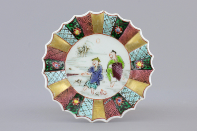 A Chinese famille rose porcelain cup and saucer with fishermen, Yongzheng, 1722-1735