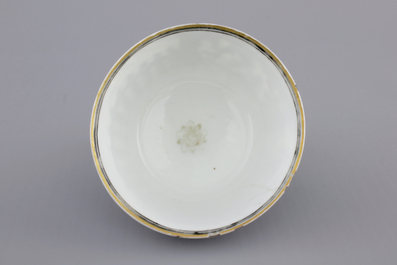 A Chinese grisaille porcelain European subject cup and saucer, Qianlong, 18th C.