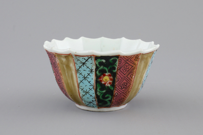 A Chinese famille rose porcelain cup and saucer with fishermen, Yongzheng, 1722-1735