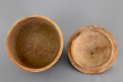 A brown-glazed pottery tripod vessel and mountain cover, Han Dynasty (206 BC-220 AC)
