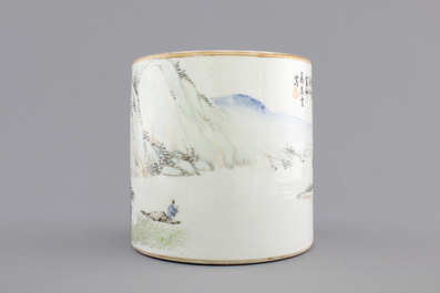 A signed Chinese Qianjiang porcelain brush pot with a landscape all over, early 20th C.