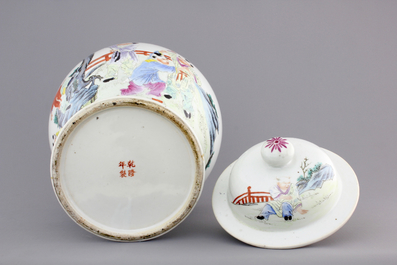 A Chinese famille rose porcelain vase with playing boys on a wooden stand, 19th C.
