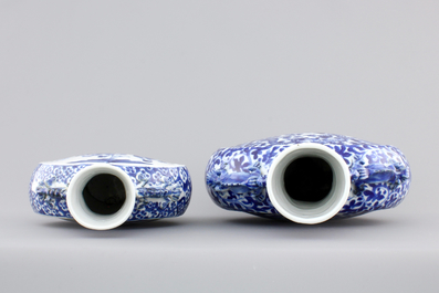 Two Chinese porcelain blue and white moon flasks, 19th C.