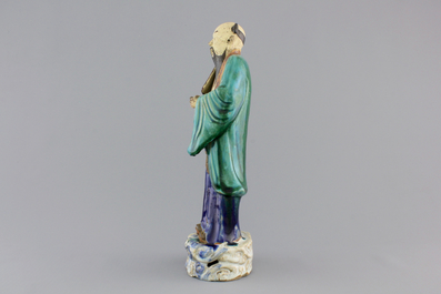 A Chinese sancai-glazed pottery figure, a famille rose teapot and a small ginger jar, 19th C.