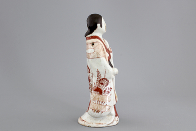 A Japanese porcelain figure of a male official, 17/18th C.