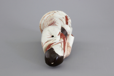 A Japanese porcelain figure of a male official, 17/18th C.