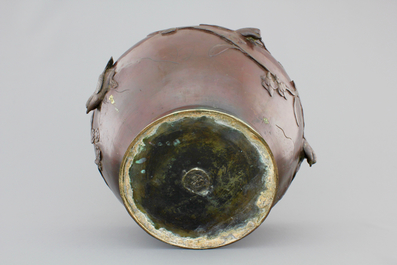 A Japanese bronze relief-decorated jardiniere, 19th C.