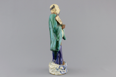A Chinese sancai-glazed pottery figure, a famille rose teapot and a small ginger jar, 19th C.