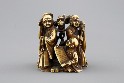 A Japanese patinated ivory netsuke: a dragon amongst sages, 19th C.