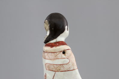 A Japanese porcelain figure of a male official, 17/18th C.
