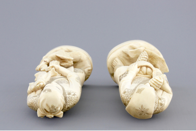 A pair of Japanese carved ivory fishermen, Meiji, 19th C.