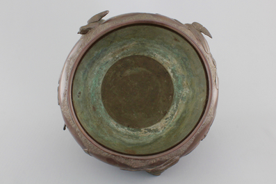 A Japanese bronze relief-decorated jardiniere, 19th C.