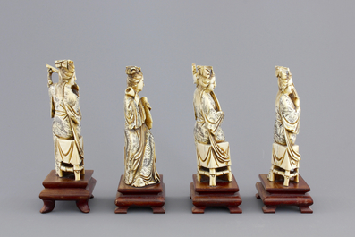 Four Chinese carved ivory ladies with instruments on wooden stands, ca. 1900