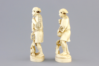 A pair of Japanese carved ivory fishermen, Meiji, 19th C.