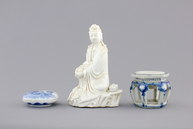 A Chinese porcelain seal wax box and cover, a Dehua blanc de Chine guanyin and a blue and white salt, 18/19th C.