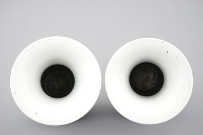 A tall pair of blue and white Chinese porcelain vases, 19th C.