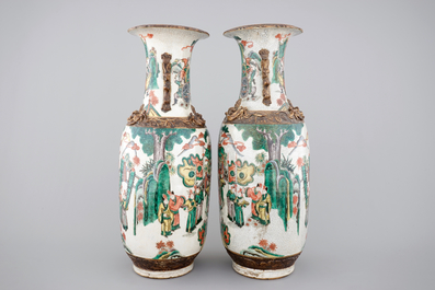 A tall pair of Chinese famille verte crackle glaze vases, Nanking, 19th C.