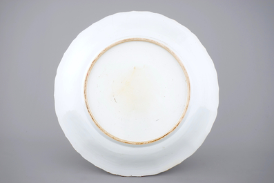 A very large blue and white Chinese dish with ladies in a garden, Kangxi, ca. 1700