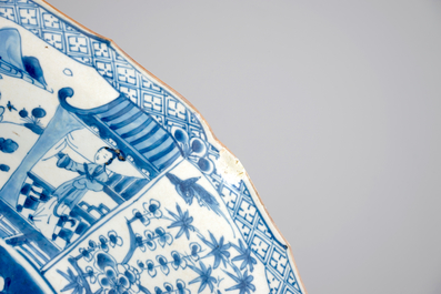 A very large blue and white Chinese dish with ladies in a garden, Kangxi, ca. 1700