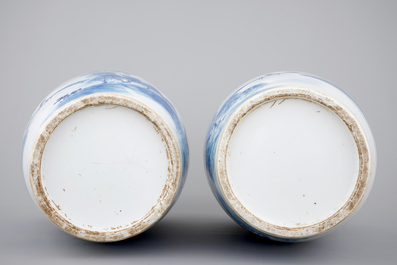 A tall pair of blue and white Chinese porcelain vases, 19th C.
