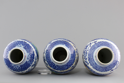 A garniture of three Chinese export porcelain Mandarin pattern vases, 18th C.