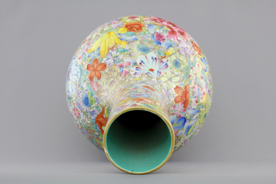 A Chinese famille rose porcelain millefleurs bottle vase, 19th C.