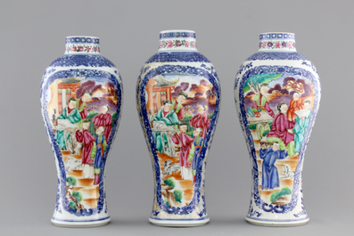 A garniture of three Chinese export porcelain Mandarin pattern vases, 18th C.