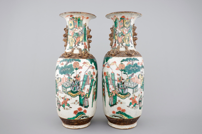 A tall pair of Chinese famille verte crackle glaze vases, Nanking, 19th C.