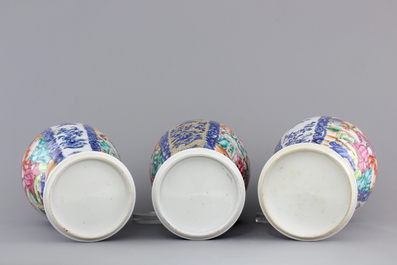 A garniture of three Chinese export porcelain Mandarin pattern vases, 18th C.