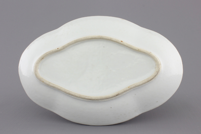 A Chinese export porcelain oval serving dish with a boat, 18th C.
