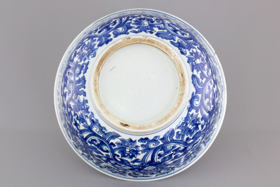 A large blue and white Chinese porcelain bowl with lotus scrolls, Kangxi, ca. 1680