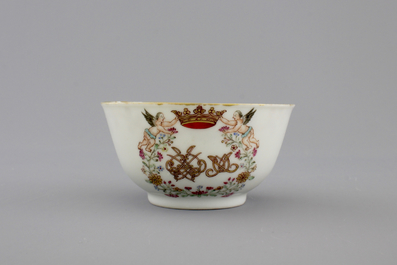 A Chinese porcelain famille rose and gilt armorial monogrammed teapot with a cup and saucer, 18th C.
