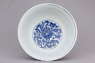 A large blue and white Chinese porcelain bowl with lotus scrolls, Kangxi, ca. 1680