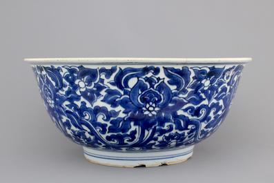 A large blue and white Chinese porcelain bowl with lotus scrolls, Kangxi, ca. 1680